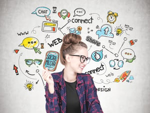 Businesswoman with social icons surrounding her