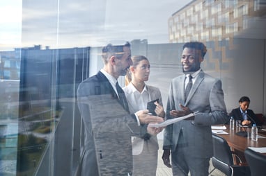 employees discussing business strategy