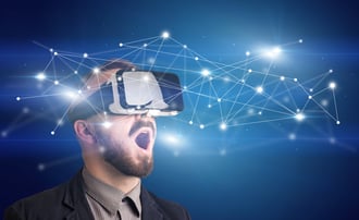 Amazed businessman with virtual reality network concept in front of him