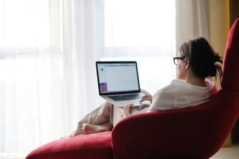 happy young woman relax at home on sofa