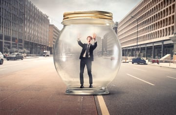 Businessman Stuck in a Jar