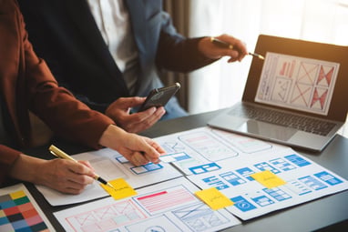 designers collaborating on application design