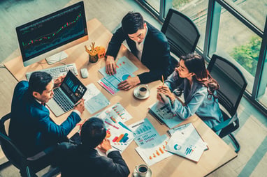 Fintech team collaborating at a roundtable