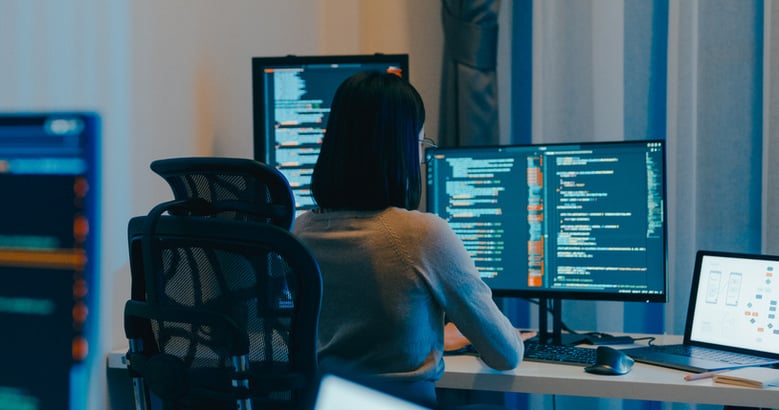 data scientist working in front of a computer