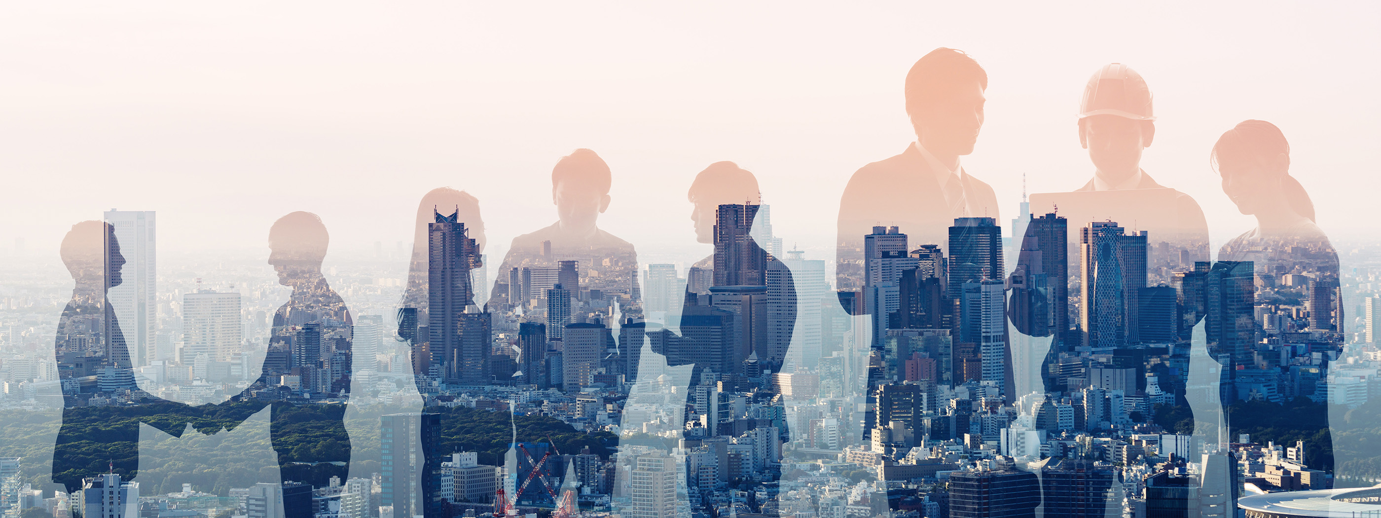 blurred people in front of a city background