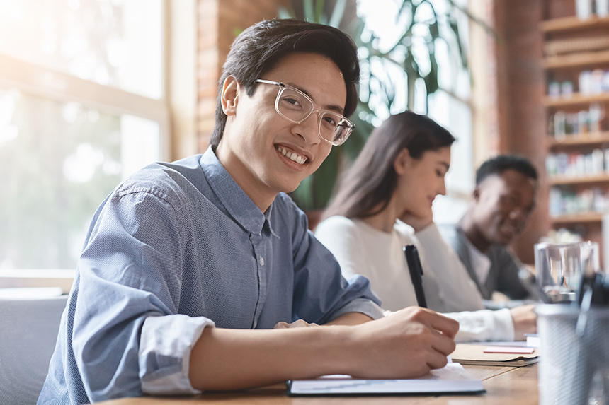 student taking notes