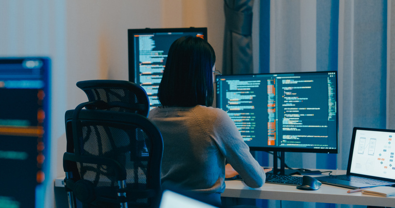 data scientist working in front of a computer
